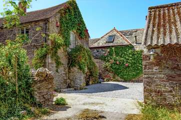 Another angle of this pretty barn with the stone steps leading up to the front door.