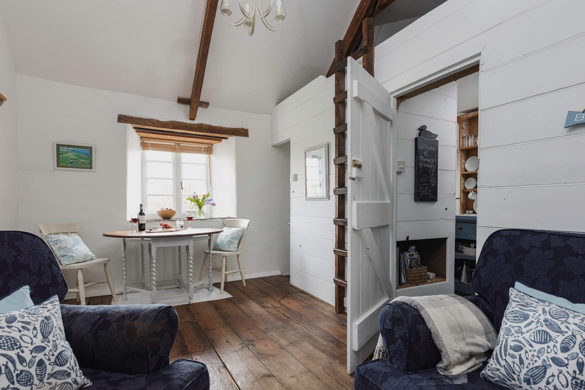 The open plan living area has oodles of character.