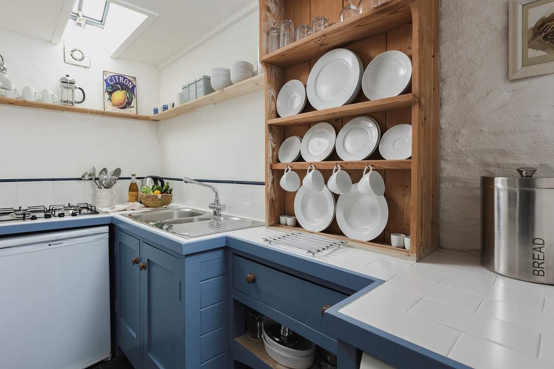 The small but perfectly formed kitchen. Please note, the gas hot has been replaced with an induction hob.