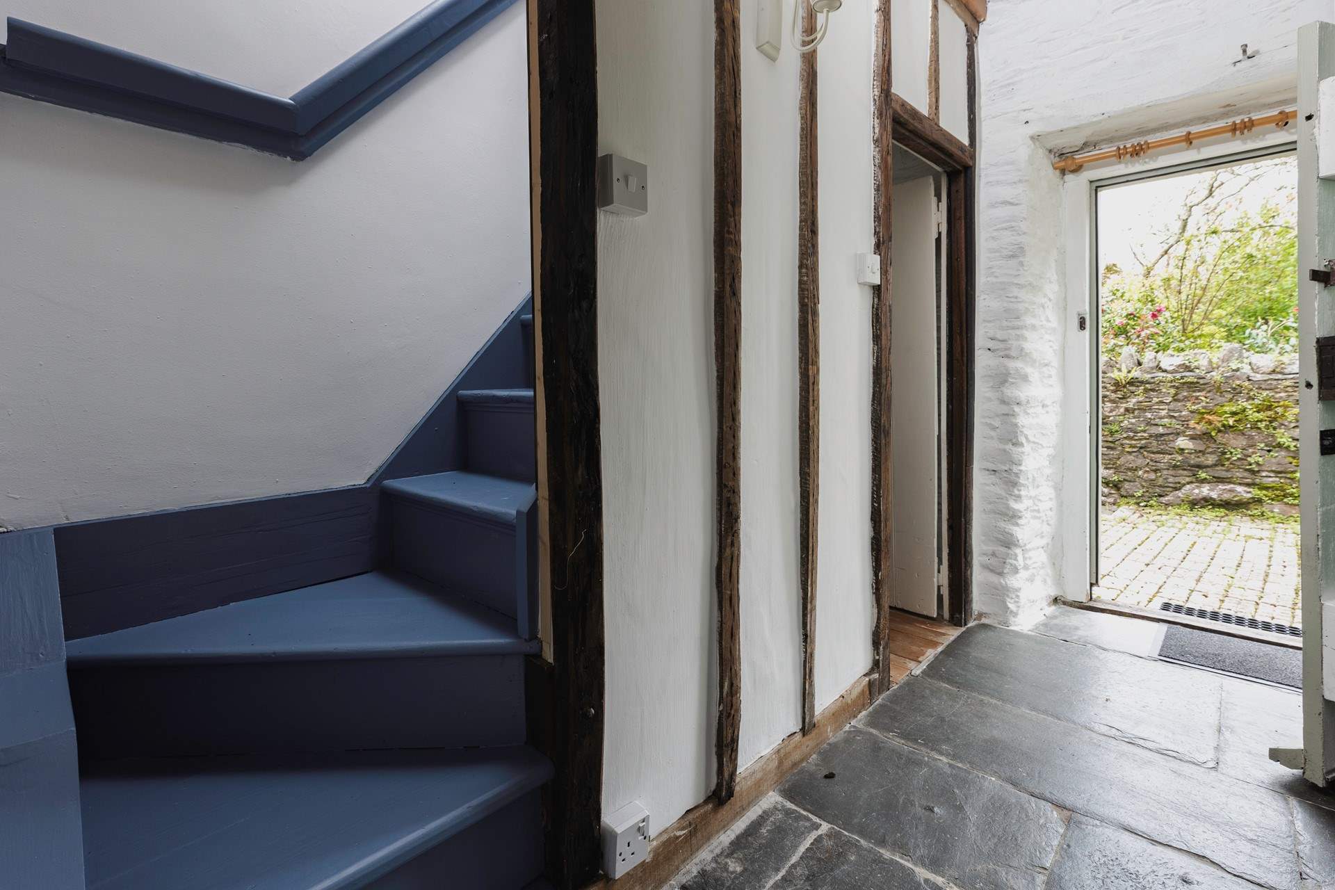 The steep stairs lead to the first floor living area.