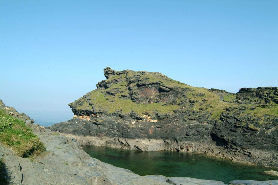 Boscastle's dog-leg harbour leads out to the open sea.