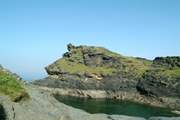 Boscastle's dog-leg harbour leads out to the open sea.