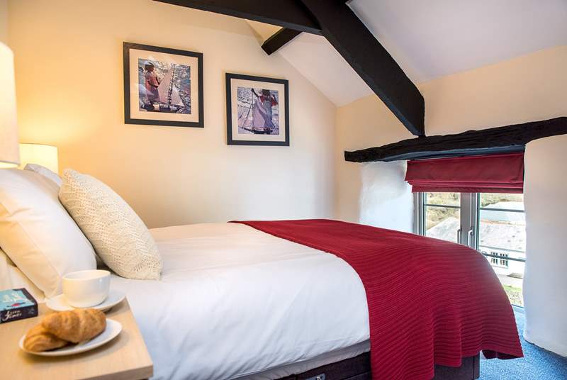 The cottage has two charming bedrooms.