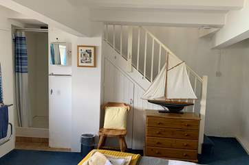 The shower is on the lower ground floor in the bedroom.