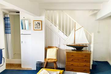 The shower is on the lower ground floor in the bedroom.