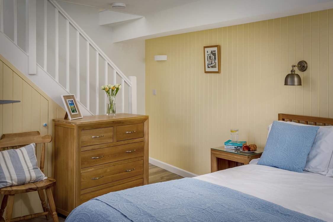 The double bedroom is down the stairs from the living area.