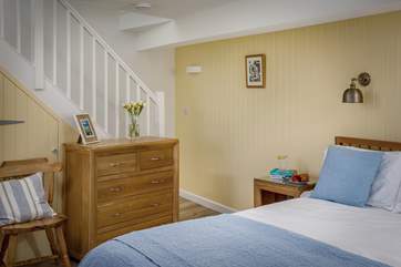 The double bedroom is down the stairs from the living area.