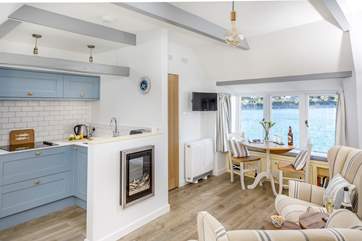 The charming interior is cosy and inviting with wonderful views of the bay.