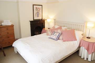 The spacious double bedroom (Bedroom 1) has lovely views out to sea and a 5' double bed.
