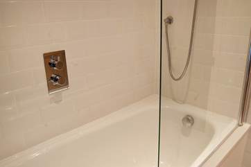 Light and bright with a bath and shower.