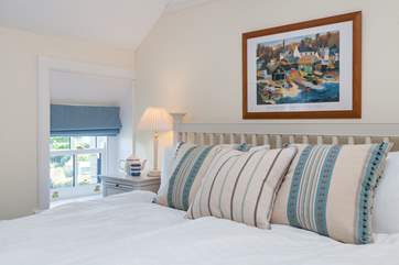 This spacious room overlooks the cove and the sea beyond, (this bed has two 3ft single mattresses on the 6ft bed frame) (Bedroom 2).