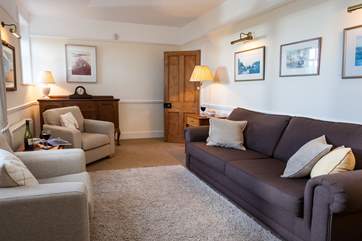 The sitting-room is lovely and cosy, enjoy a glass of wine and good company.