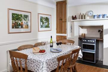 The kitchen is the heart of the cottage and leads to the sitting-room, dining-room and also the utility-room.