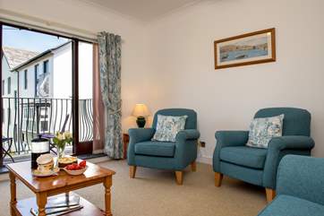 The French windows open to your balcony; let the sea air in.