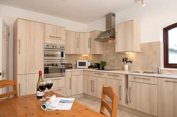 The kitchen/diner is well-equipped and perfect for sociable meals.