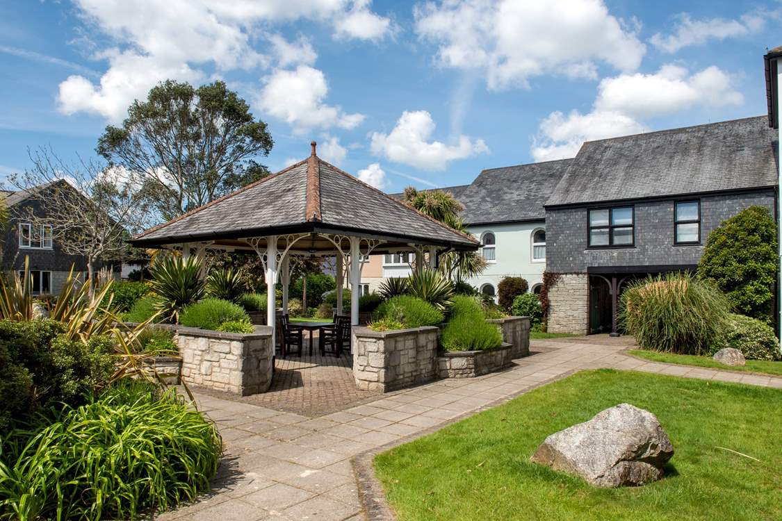 Explore the well-maintained communal gardens.