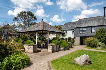 Explore the well-maintained communal gardens.