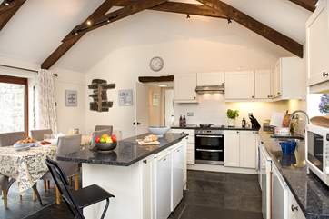The kitchen/dining-room is sure to become the focal point of your holiday.