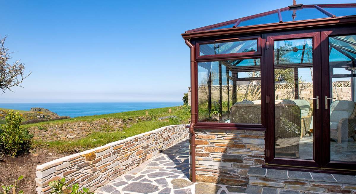 The conservatory and patio take full advantage of the view.