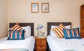 The seaside cushions and prints perfectly suit the coastal location. - Thumbnail Image