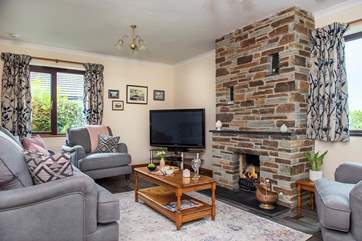 The large TV is perfect for watching a holiday film together (the living flame fire is currently out of action).
