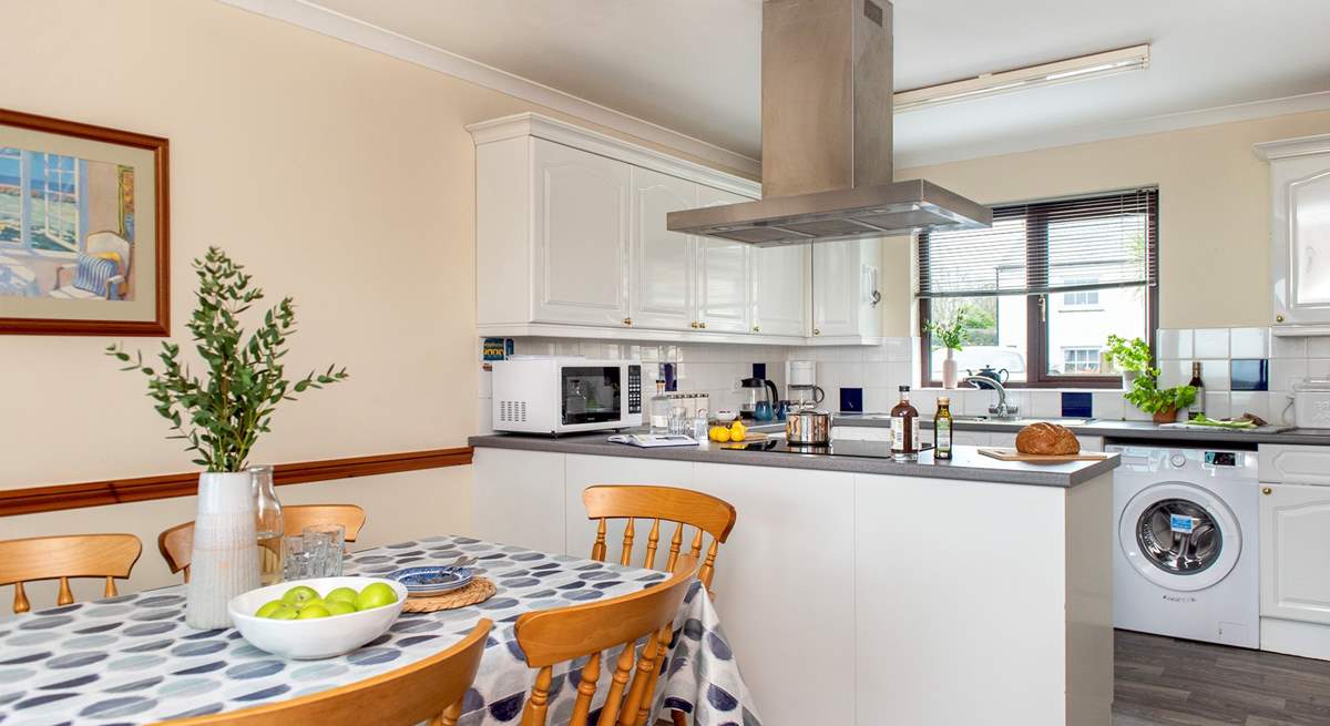 The kitchen/dining-room is wonderfully light and airy.