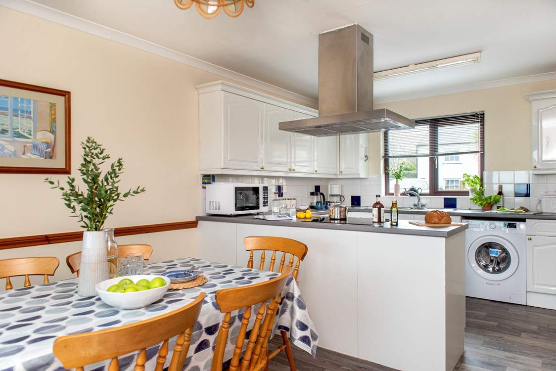 The kitchen/dining-room is wonderfully light and airy.