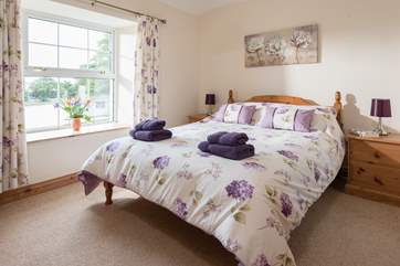 The pretty double bedroom (Bedroom 1) has an en suite shower-room.