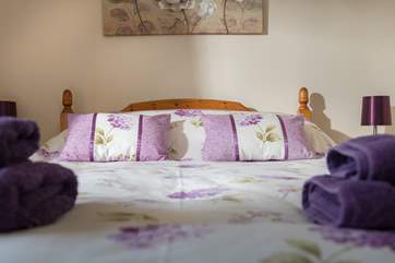 There are fresh floral colours throughout the bedrooms.