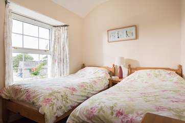 The smaller of the twin bedrooms.