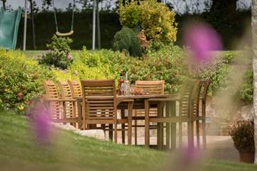 The large patio is the perfect spot for spending time with friends and family.