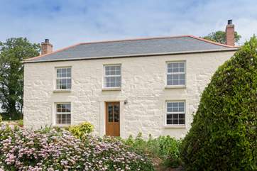 The farmhouse is divided into two with the owners entrance on the right side of the building and guests use the front door, each is totally separate and private.