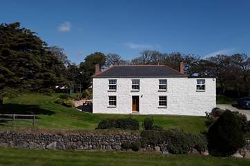 The farmhouse is divided into two with the owners entrance on the right side of the building and guests use the front door, each is totally separate and private.