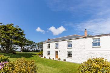 The farmhouse is divided into two with the owners entrance on the right side of the building and guests use the front door, each is totally separate and private.