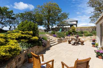 A large terrace is accessed through the dining room doors and is perfect for dining alfresco.