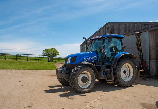 The children will love to see the tractors and the machines on this working dairy farm.