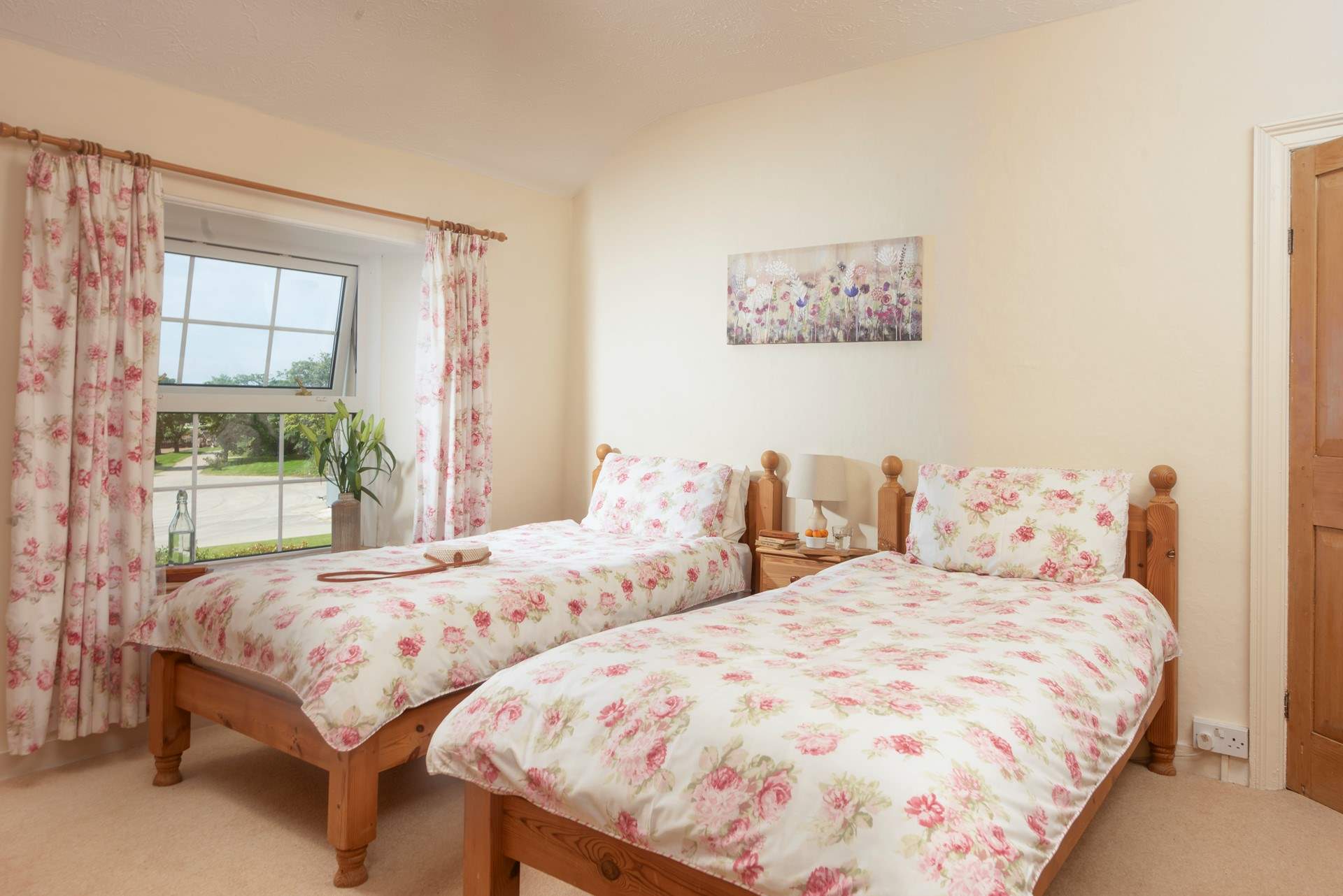 The larger twin room has plenty of space.