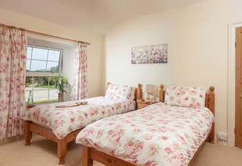 The larger twin room has plenty of space.