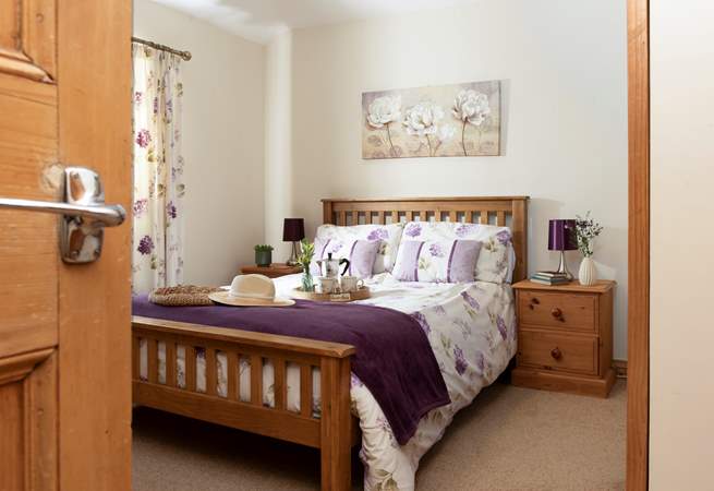 Floral hues and comfortable furnishings.