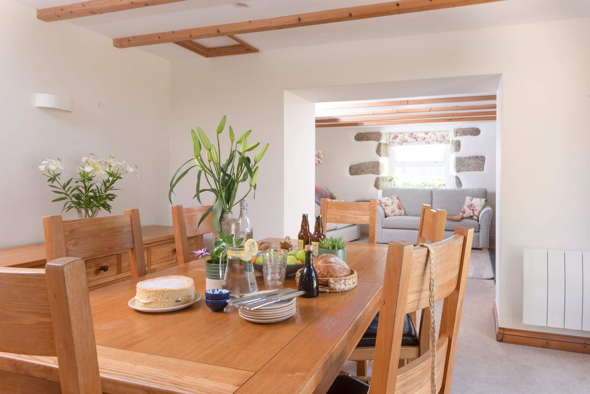 The living space is open plan with a neutral palate.