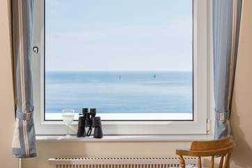 Sit and watch the ships pass by.