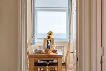 Look down the hallway from the bedrooms straight out to sea.