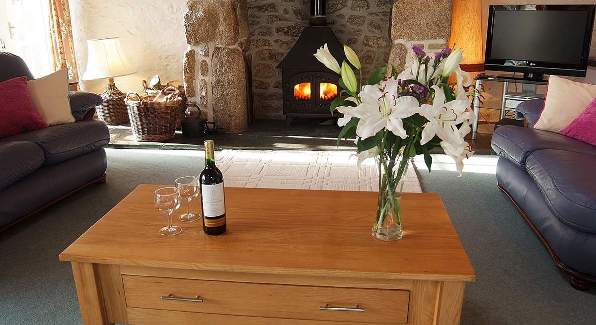 Warm your toes and the wine in front of the trusty wood-burner - perfect holiday occupations!