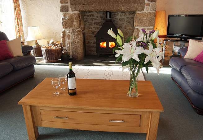 Warm your toes and the wine in front of the trusty wood-burner - perfect holiday occupations!