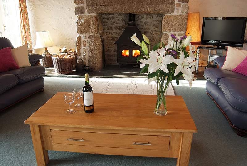 Warm your toes and the wine in front of the trusty wood-burner - perfect holiday occupations!