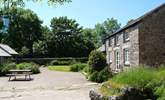 The sunny courtyard in front of Trethevey (you can just see the back of Snuggledown across the courtyard on the left, facing away from Trethevey). - Thumbnail Image