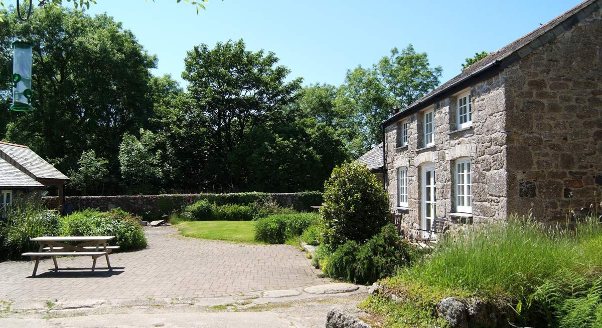 The sunny courtyard in front of Trethevey (you can just see the back of Snuggledown across the courtyard on the left, facing away from Trethevey).