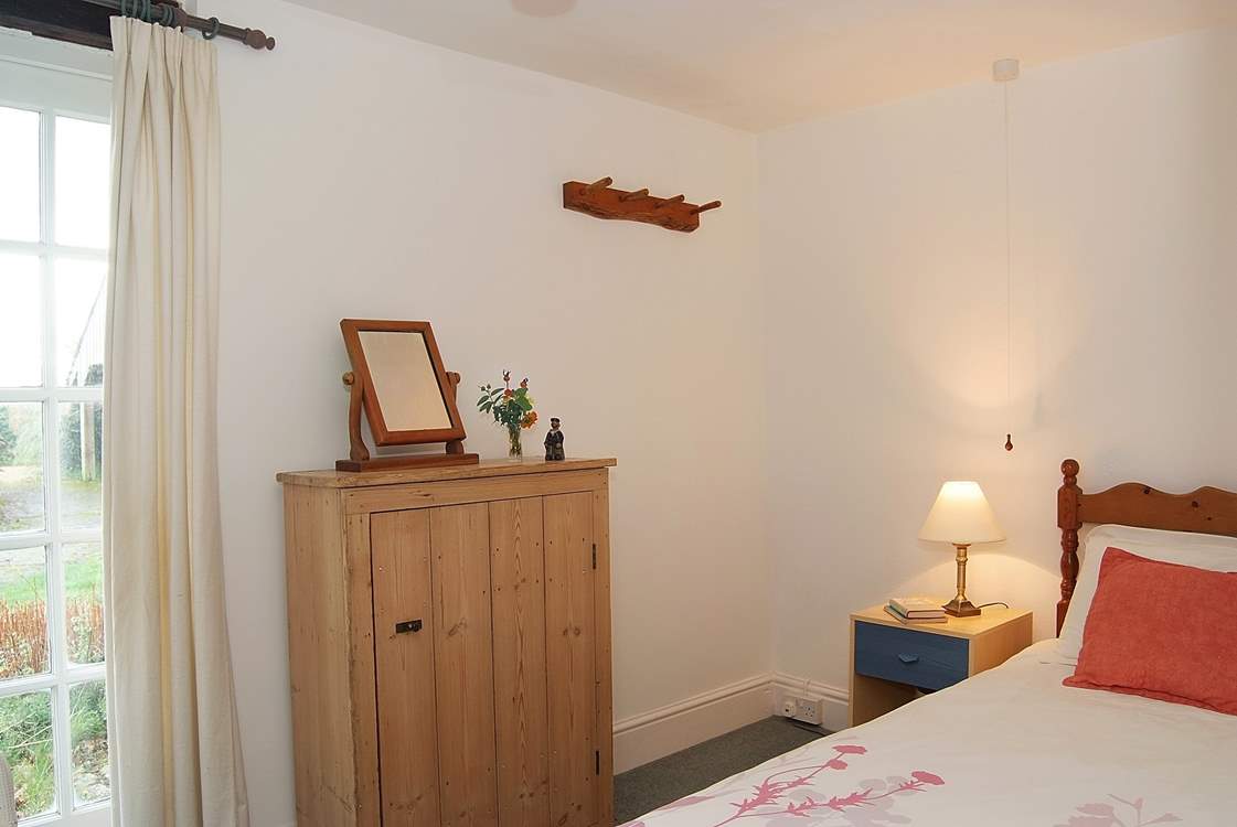 Bedroom 1 (ground floor) has a single bed.