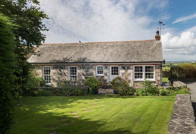 Pretty Corlan Cottage is located in the heart of the village.
