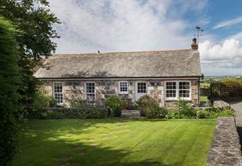 Pretty Corlan Cottage is located in the heart of the village.